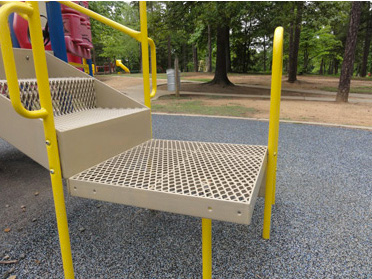 Accessible playground entry platform and stairs designed for ADA compliance in public parks and school playgrounds.